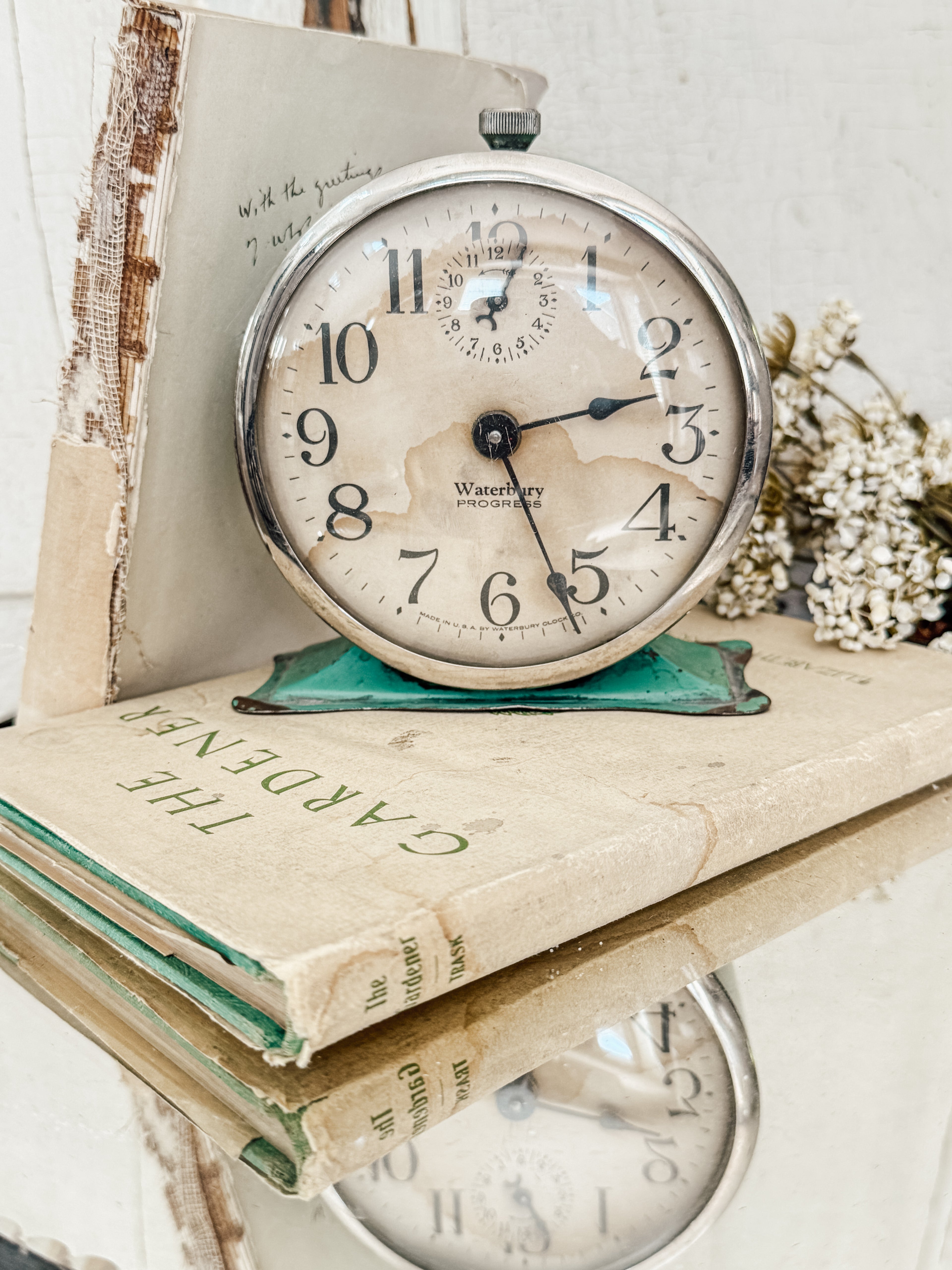 Vintage green Waterbury alarm clock
