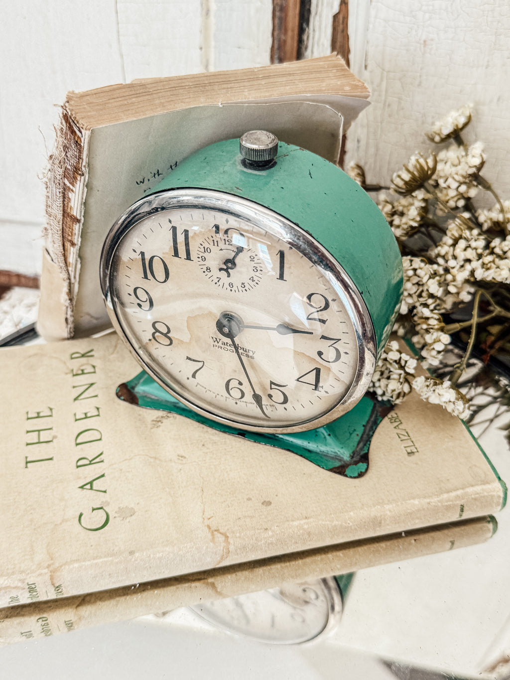 Vintage green Waterbury alarm clock