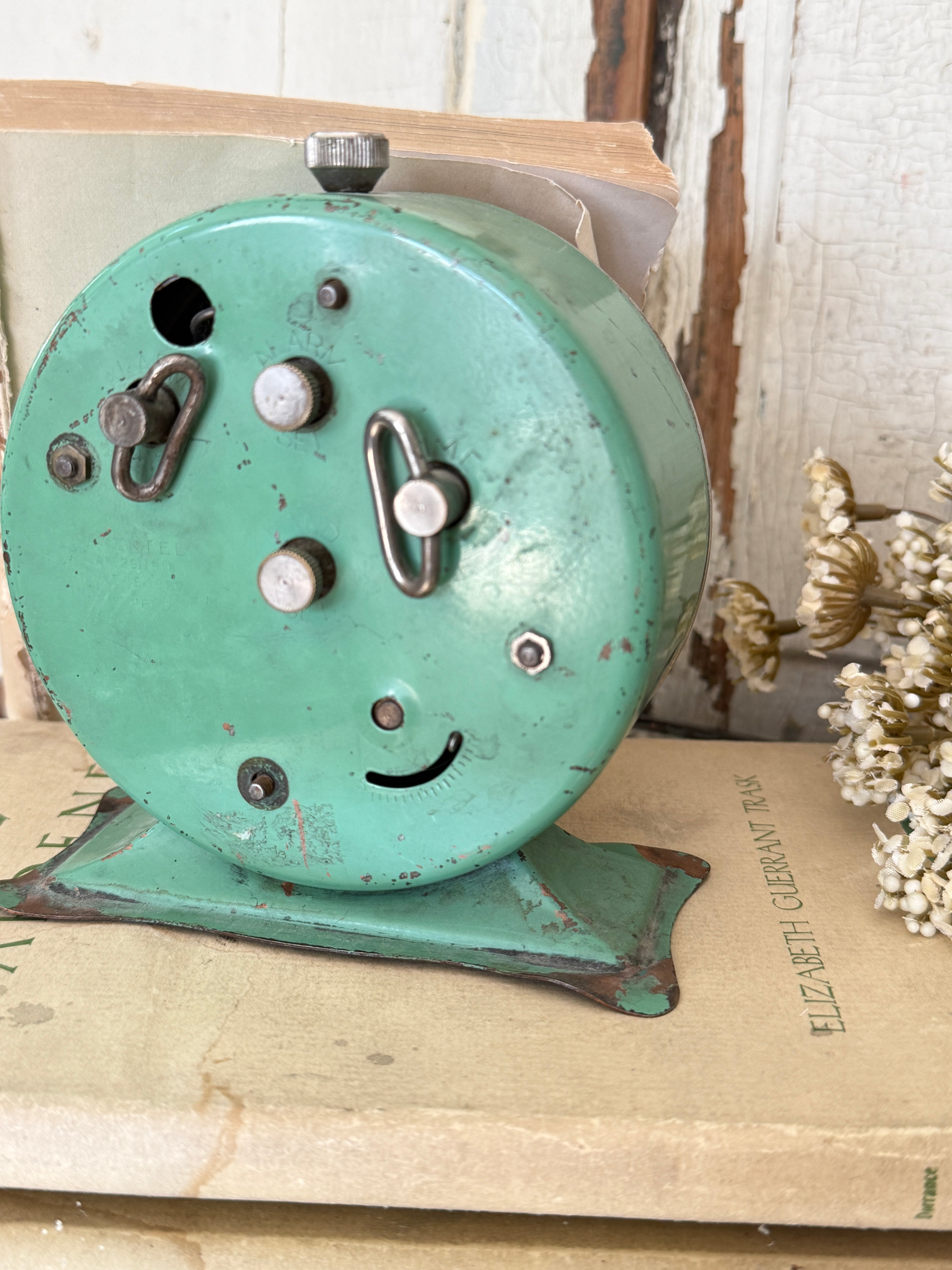 Vintage green Waterbury alarm clock