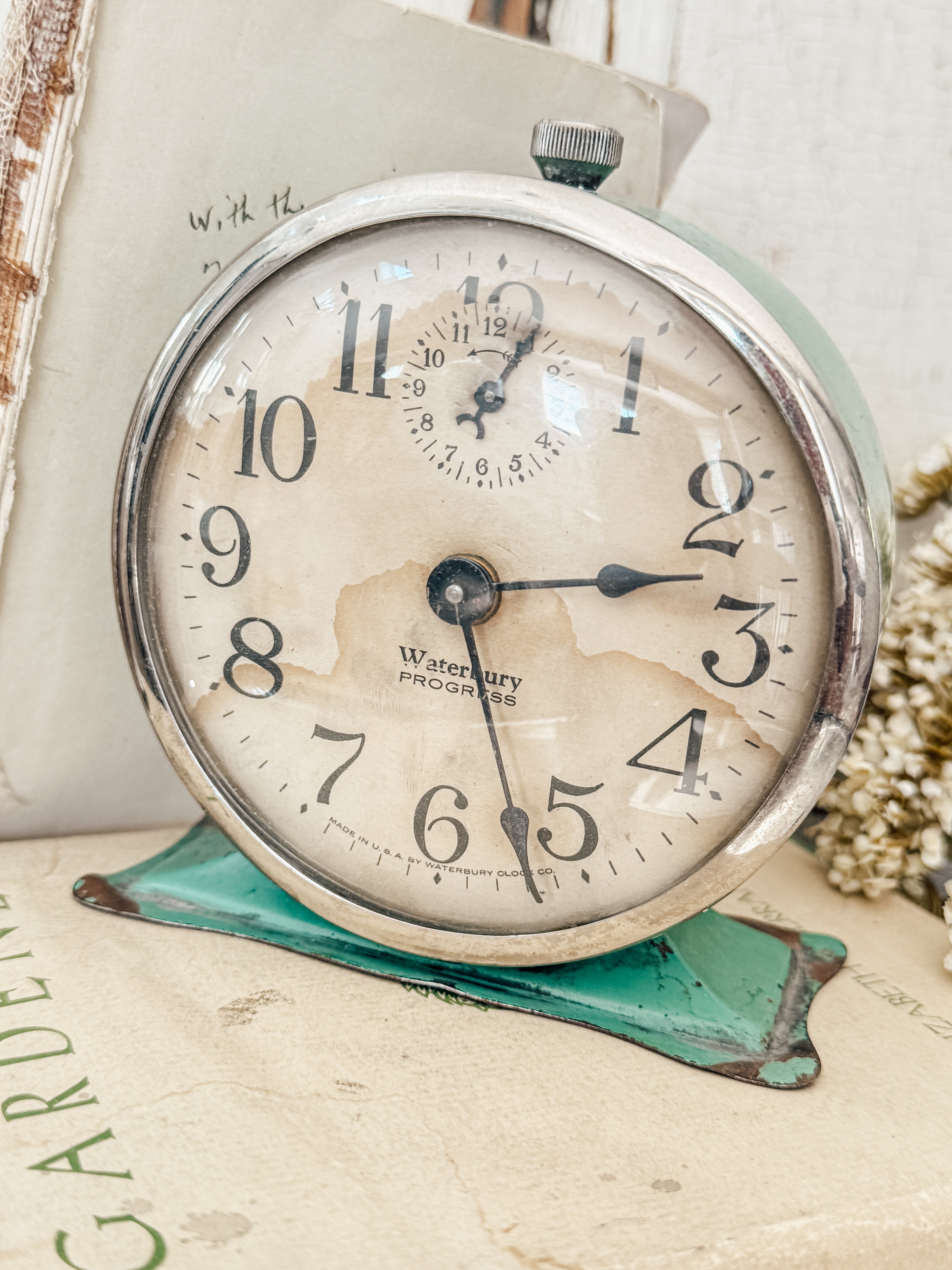 Vintage green Waterbury alarm clock